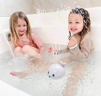Water-Activated Glowing Sprayer Toy ~ Light-up bath fun with instant fountain play.