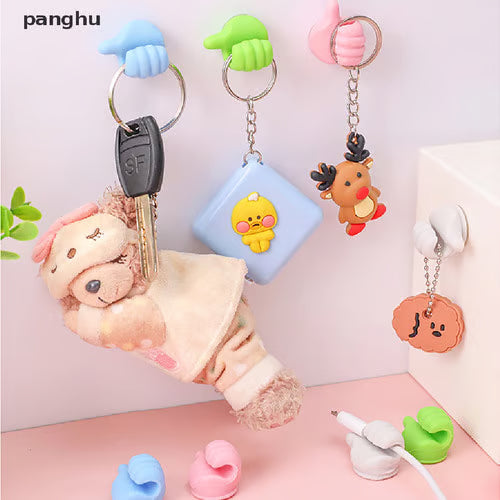Thumbs Up Wall Hook ~ Tiny hook, big help for everyday clutter.