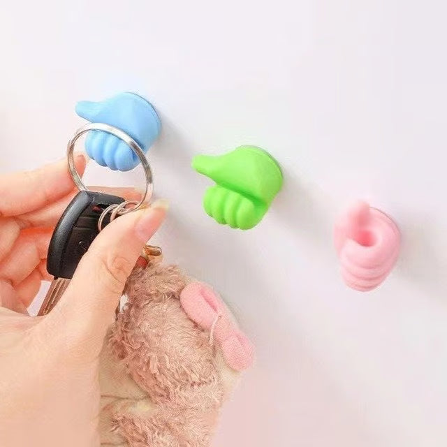 Thumbs Up Wall Hook ~ Tiny hook, big help for everyday clutter.