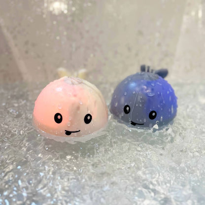 Water-Activated Glowing Sprayer Toy ~ Light-up bath fun with instant fountain play.
