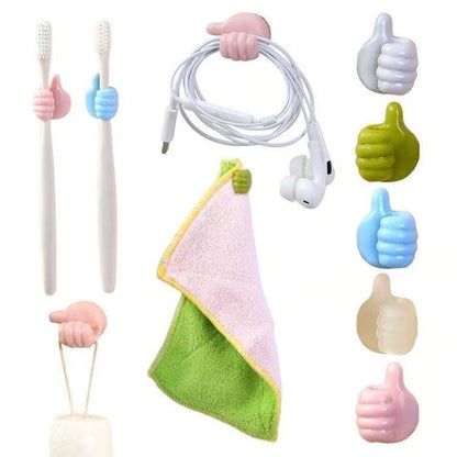 Thumbs Up Wall Hook ~ Tiny hook, big help for everyday clutter.