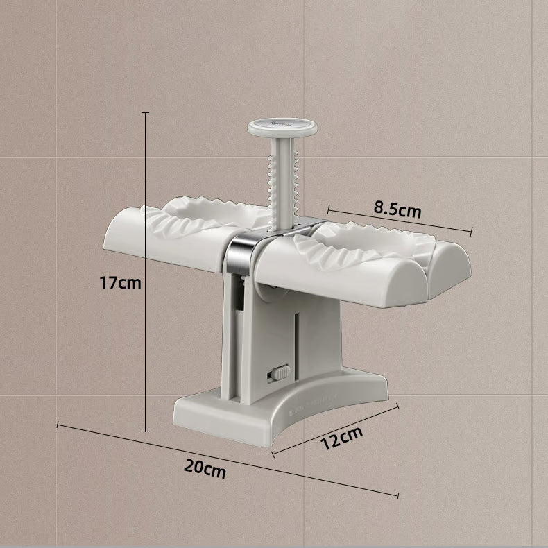 Double Head Dumpling Maker ~ Seal two perfect dumplings in one press.