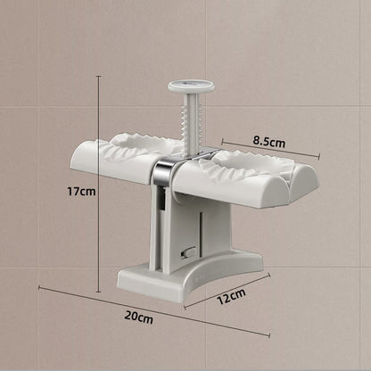Double Head Dumpling Maker ~ Seal two perfect dumplings in one press.